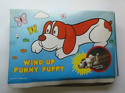 #ad vintage Wind Up Funny Puppy Display box with 4 plastic pieces $19.99