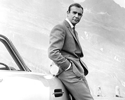 #ad Sean Connery as Bond leaning on Aston in mountains Goldfinger 8x10 photo $10.99