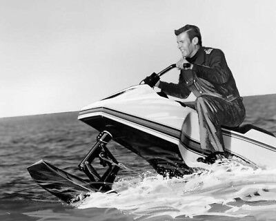 #ad Roger Moore sits on jetski on ocean as Bond The Spy Who Loved Me Poster 24x36 $29.99