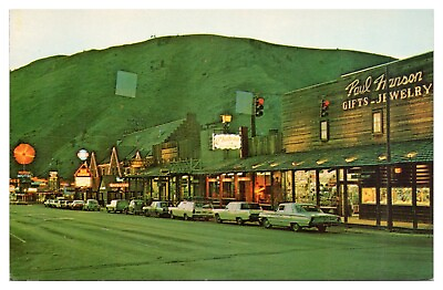 #ad Jackson Wyoming WY at Night Postcard Paul Hanson Gifts and Jewelry Old Cars Unp $3.25