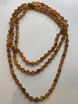 #ad 8.62 Vintage necklace long amber color lucite $32.00