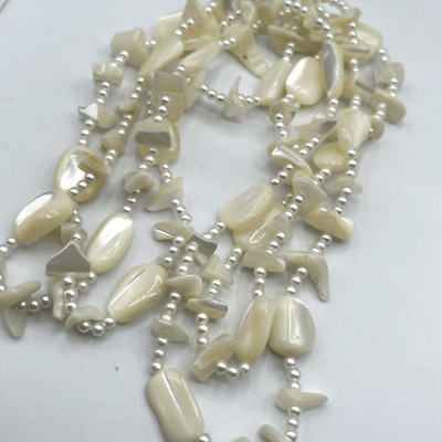 #ad Vintage boho seed pearl and mother of pearl necklace. 40” long $21.00