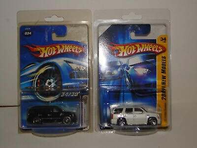 #ad 2006 First Editions #x27;07Cadillac Escalade x2 white and black in protector paks $12.00
