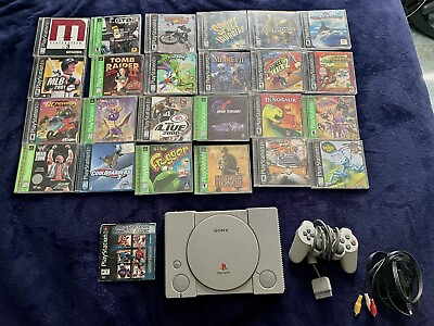 #ad Sony playstation 1 with games read description $315.00